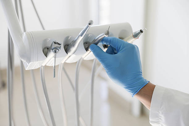 Professional Tooth Extraction technician working in Hinton, OK